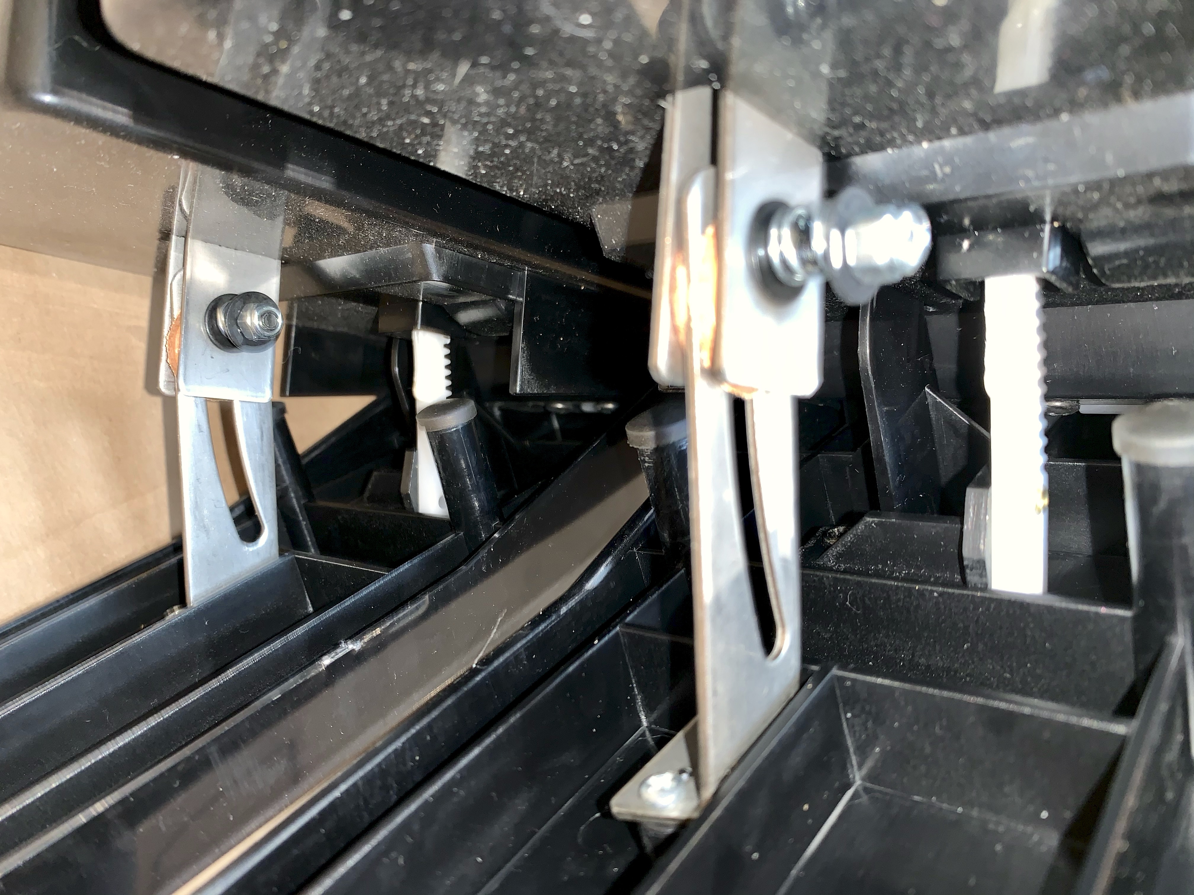 View of the Viscount hinge. You can tighten the pedal down by tightening the screw. There is a &lsquo;friction&rsquo; pad and a spring that helps keep the pedal in place.