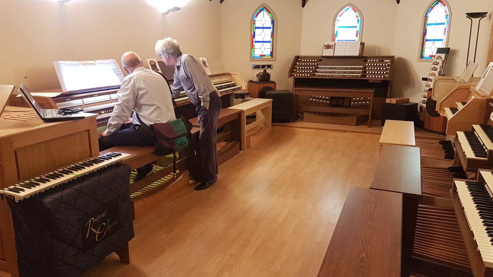 large number of viscount organs in their showroom. 